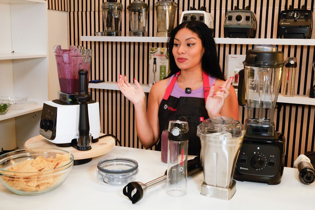 A host demoing a product on the kitchen set