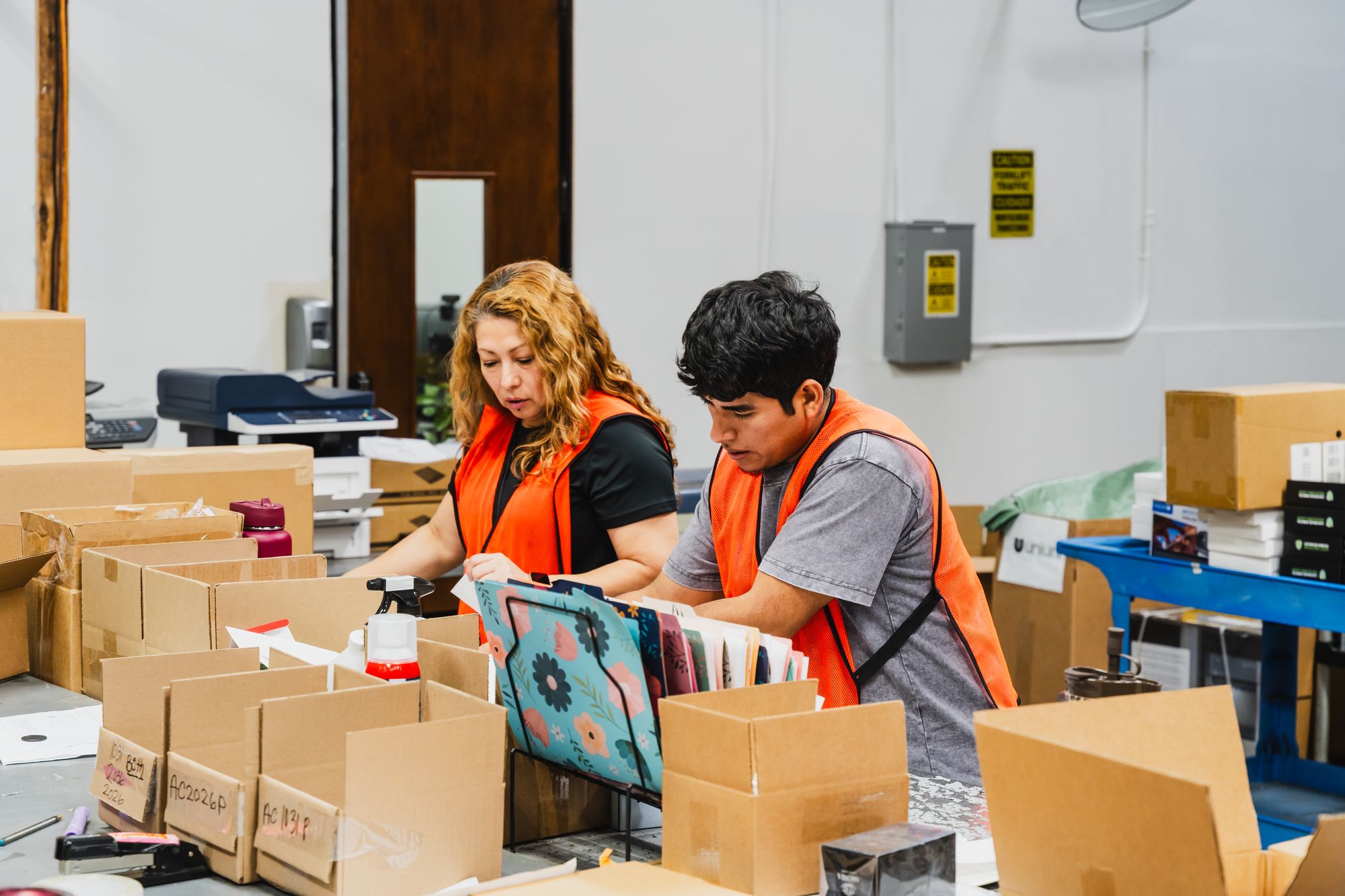 Team members packing orders